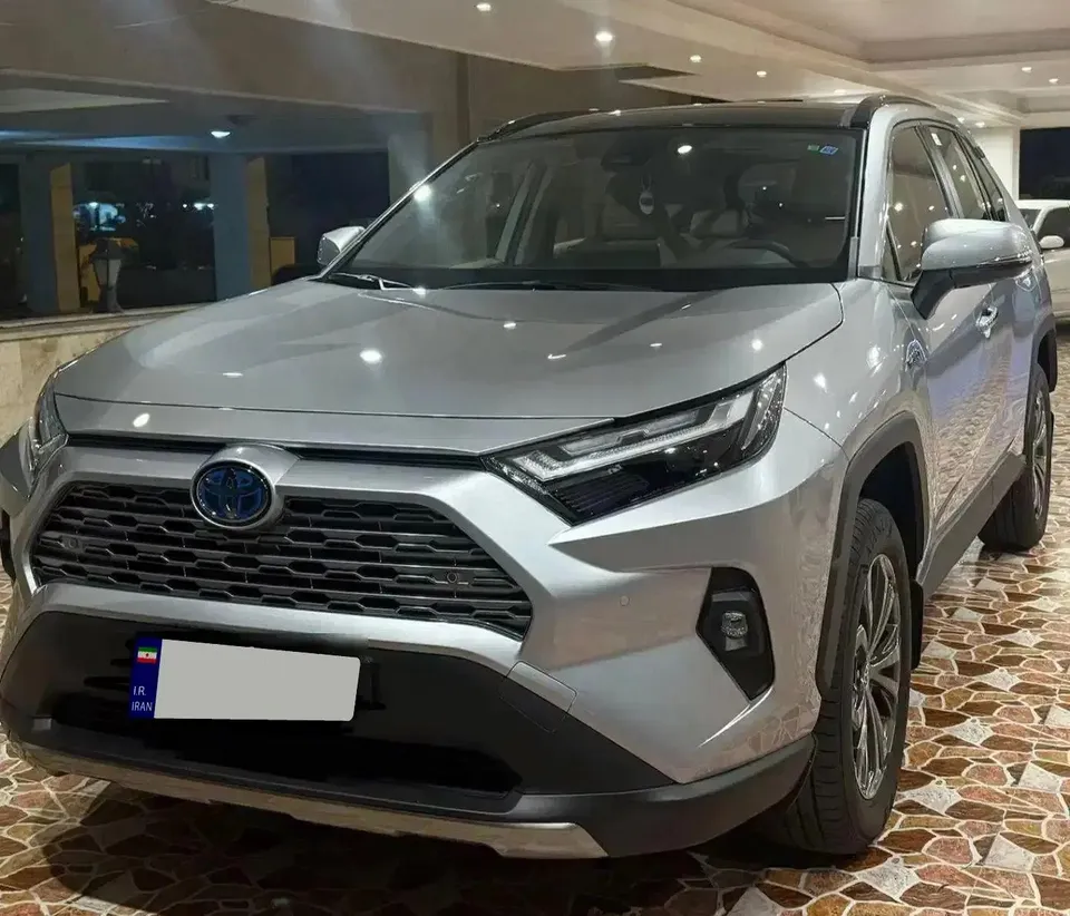 نمای جلو و کناری تویوتا راوفور ۲۰۲۴ هیبرید نمای جلو و کناری تویوتا راوفور ۲۰۲۴ هیبرید